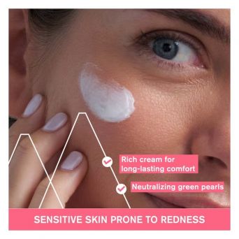 Close-up of Uriage Roséliane Anti-Redness Cream applied to cheek, highlighting rich texture and neutralizing green pearls for redness