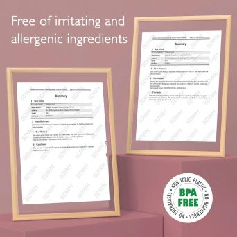 Framed clinical test reports for Momcozy Hydrogel Breast Pads, certifying them as free of irritating and allergenic ingredients. Includes a 