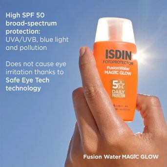 Hand holding ISDIN Magic Glow SPF 50 broad-spectrum sunscreen with Safe Eye Tech, no eye irritation