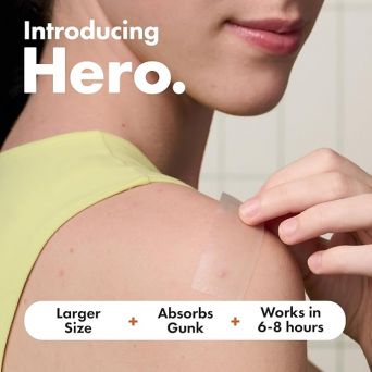 Woman applying the best body acne patch Dubai on her shoulder to absorb gunk in 6 to 8 hours.