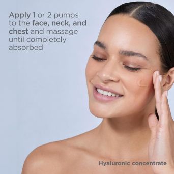Woman applying ISDIN Hyaluronic Concentrate Serum to her face while demonstrating how to use 1–2 pumps for full absorption.